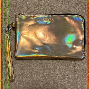 Juicy Couture wristlet with powerbank